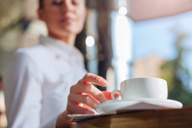istock Female hands taking a cup of coffee 854559516