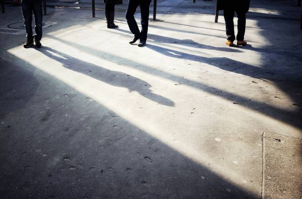 istock Shadows of pedestrians in Paris 854570058