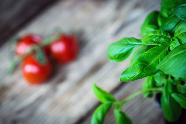 tomatoes on rustic wooden table, Top view, place for typography