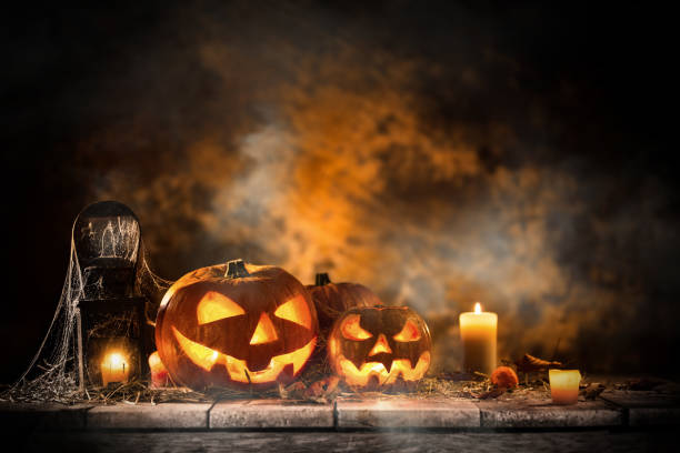 istock Halloween Pumpkins on old wooden table 854578972