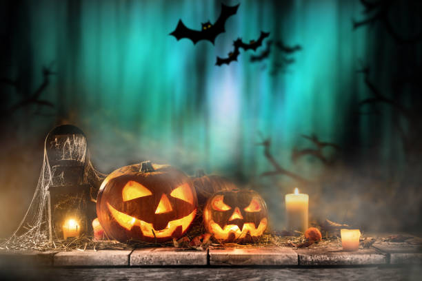 istock Halloween Pumpkins on old wooden table 854579196