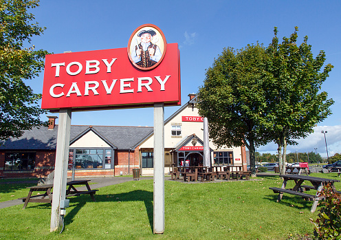 Swansea, UK: September 19, 2017: Front view of a Toby Carvery restaurant. Toby Carvery are a chain brand of over 150 restaurants established for over 30 years. Home of the Roast is their slogan.