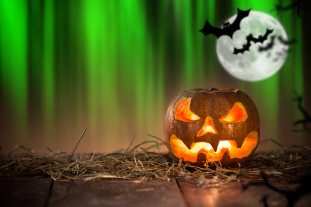 istock Halloween Pumpkin on old wooden table 854582070
