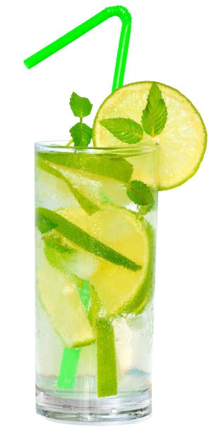 istock Fruit lemonade with lime and ice cubes and leaf mint in a highball glass 854624042