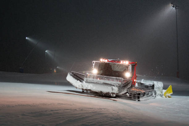 istock Snowcat ratrak prepares the ski slope. 854624582