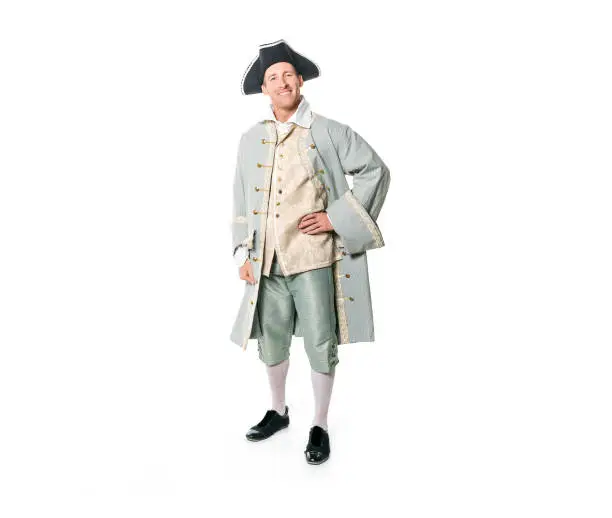 A man dressed as a courtier or prince on white background