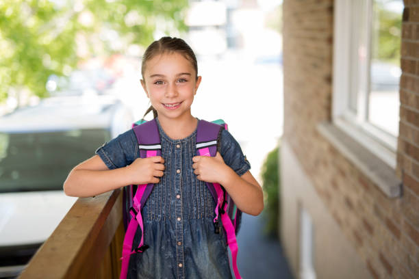 istock Beautiful little girl with backpack ready back to school 854631802