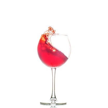 Red wine in a glass. The concept of alcoholic beverages, restaurant, cafe, utensils, holiday.