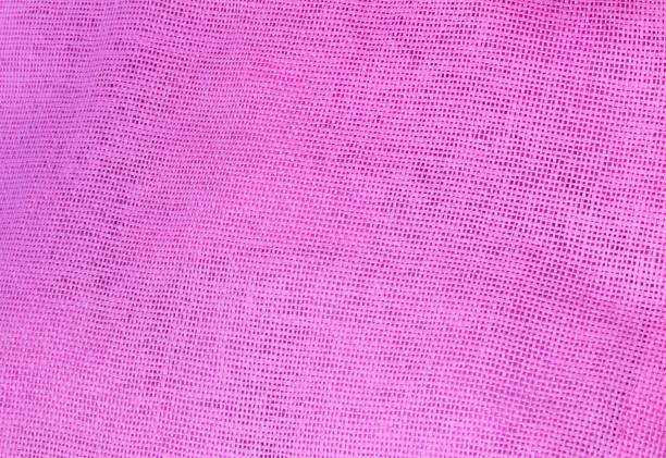istock Pastel Background of Pink Cotton Textile Texture 854635542
