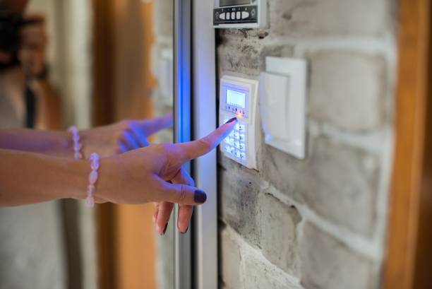 Alarm keypad installed near a doorway