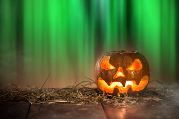 istock Halloween Pumpkin on old wooden table 854643682