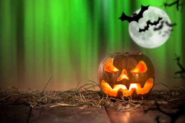 istock Halloween Pumpkin on old wooden table 854643790