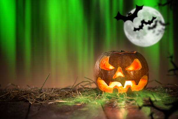 istock Halloween Pumpkin on old wooden table 854643900