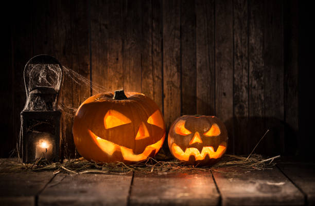 istock Halloween Pumpkins on old wooden table 854644000