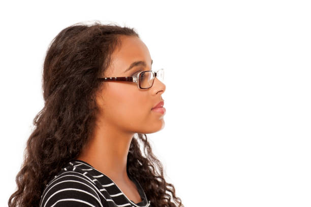 istock beautiful young dark skinned woman posing with eyeglasses 854646518