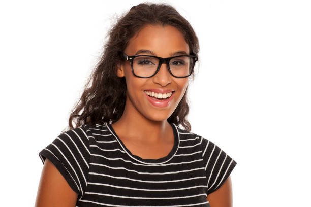 istock beautiful young dark skinned woman posing with eyeglasses 854646752