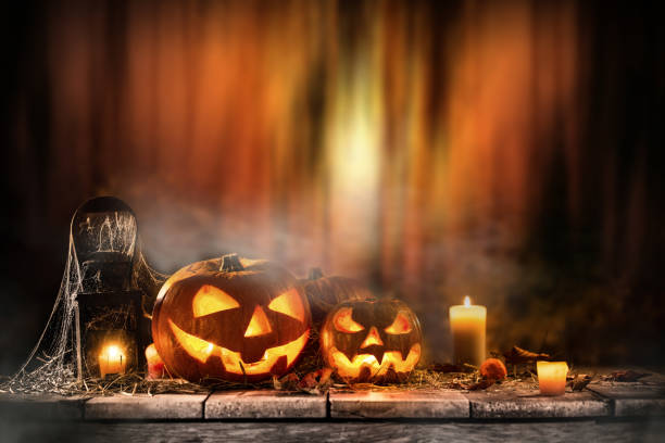 istock Halloween Pumpkin on old wooden table 854648032