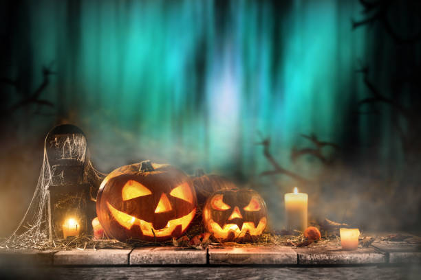 istock Halloween Pumpkin on old wooden table 854648184