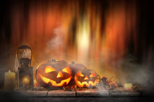 istock Halloween Pumpkin on old wooden table 854648338
