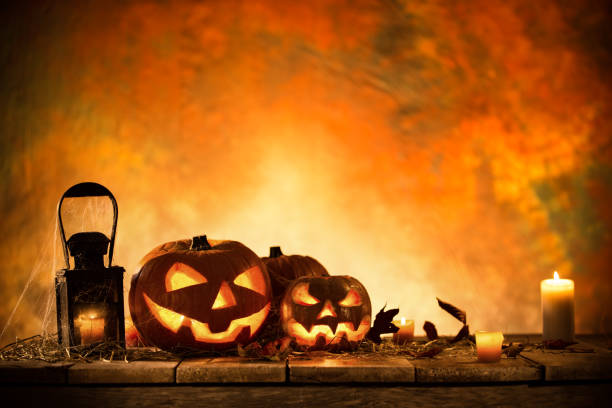 istock Halloween Pumpkin on old wooden table 854652674