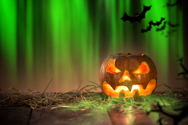 istock Halloween Pumpkin on old wooden table 854652998