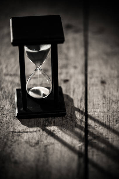 istock Close-up Hourglass on wood background 854663692