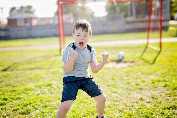 istock Young caucassian soccer player football 854666930