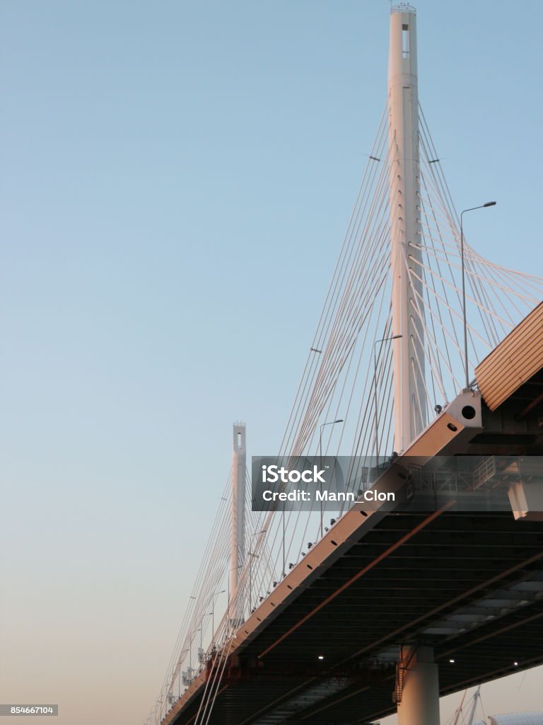 cable-stayed bridge over the river No People Stock Photo