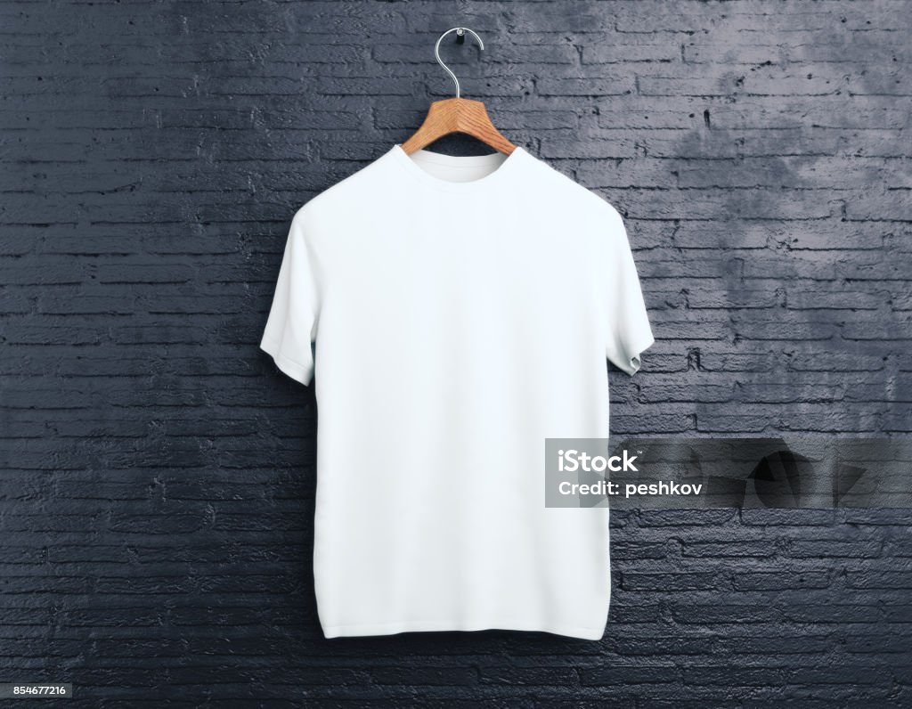 White t-shirt on brick background Wooden hanger with empty white t-shirt hanging on dark brick background. Shopping concept. Mock up. 3D Rendering T-Shirt Stock Photo