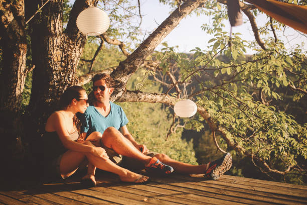 istock Young couple enjoying a beautiful view in the nature 854677380