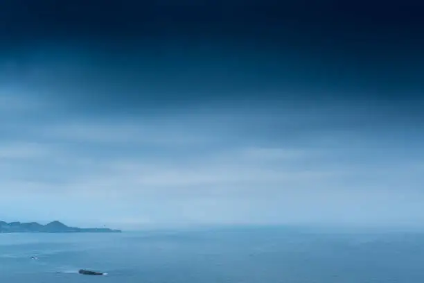 Photo of Dark Cloudy Sky Above Yaquina Head Lighthouse