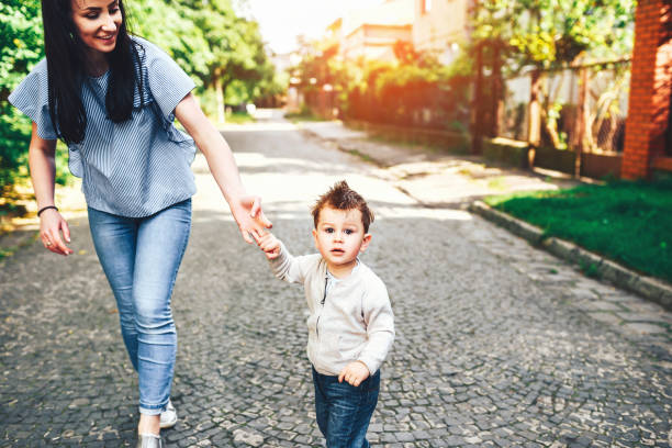 istock Young mother with her little son outdoor 854681346