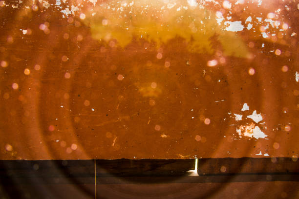 istock Close Up Lens Flare On Old Damaged Wall 854682066