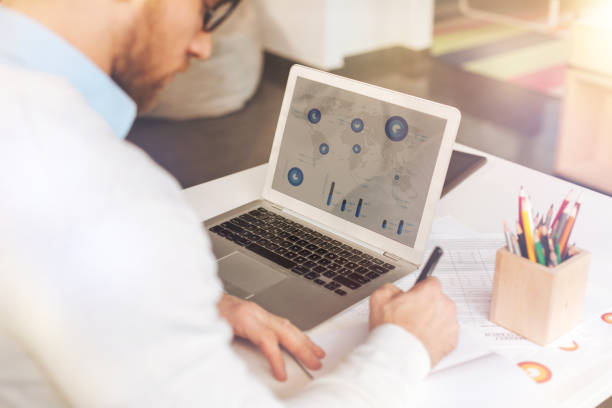 istock Millennial male entrepreneur working on serious project 854689822