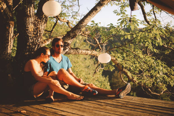 istock Young couple enjoying a beautiful view in the nature 854697162