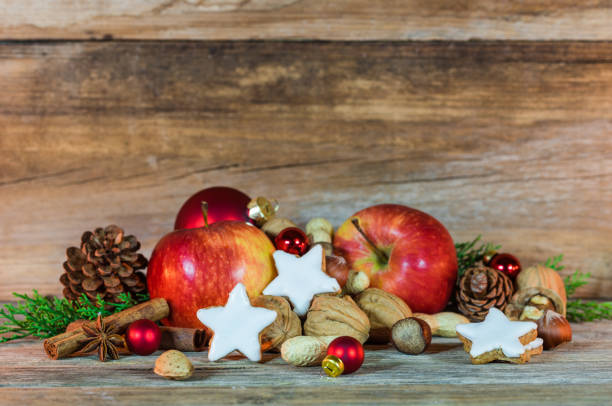 istock Christmas composition with apples, star cookies and nuts 854697446