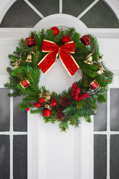 istock Christmas wreath on a  door 854704100