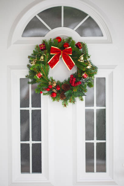 istock Christmas wreath on a  door 854709342