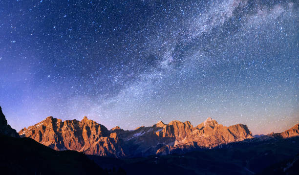 istock fantastic winter meteor rain and mountains in the mist 854713732
