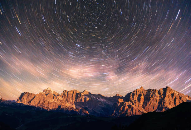 istock fantastic winter meteor rain and mountains in the mist 854713844