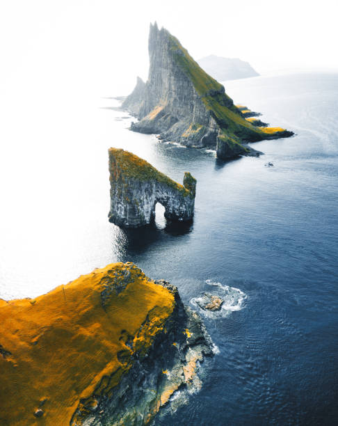 aerial view of the dranganir rock at the faroe islands dranganir rock at the faroe islands faroe islands photos stock pictures, royalty-free photos & images