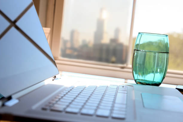 istock working place with laptop, digital tablet; graphs at the office 854747988
