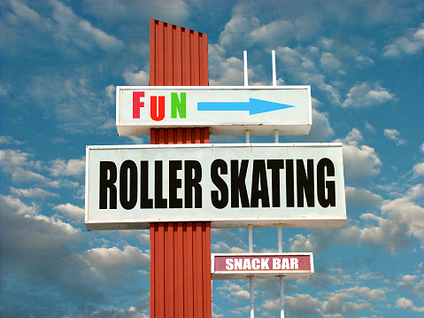 old vintage roller skating sign