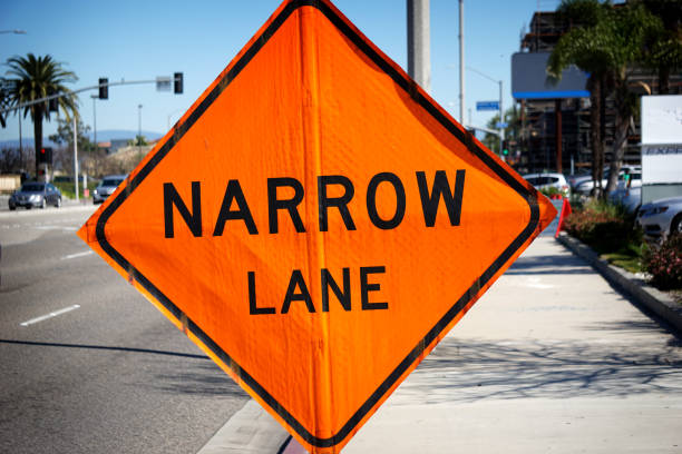 istock narrow lane sign 854754116