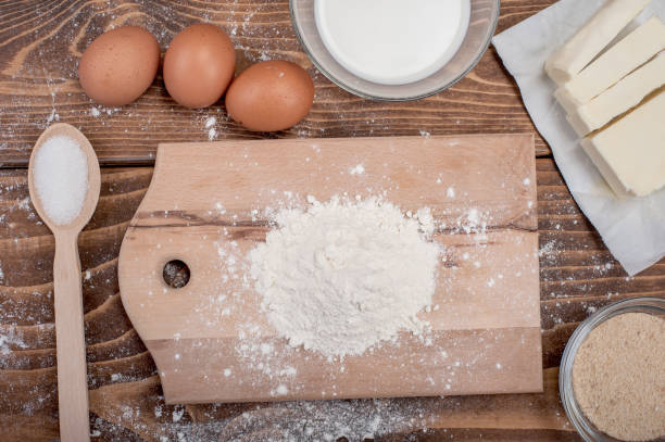 istock Dough recipe ingredients on vintage rural wood kitchen table 854757528