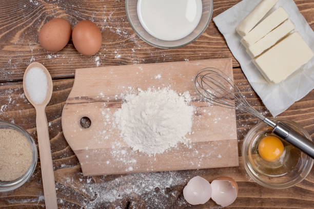 istock Dough recipe ingredients on vintage rural wood kitchen table 854757724