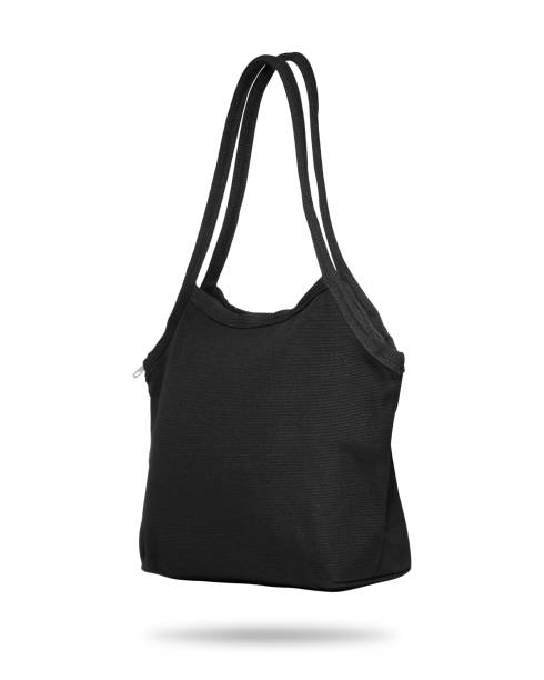 istock Black fabric bag isolated on white background. Cloth handbag for your design. Recycled material. Clipping paths object. 854776400