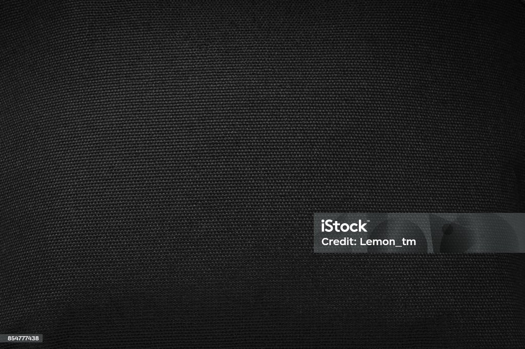 Black fabric texture background. Detail of dark textile. Textile Stock Photo