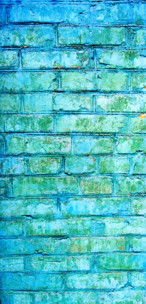 istock Texture of old blue and gray brick wall surface with cement and concrete seams 854780120