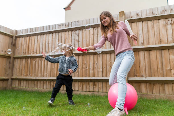 istock Mom and baby making some bubbles 854804540